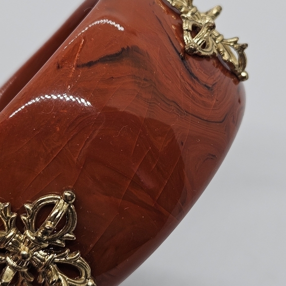 wide red-orange acrylic bangle bracelet with gold tone details - Picture 3 of 3